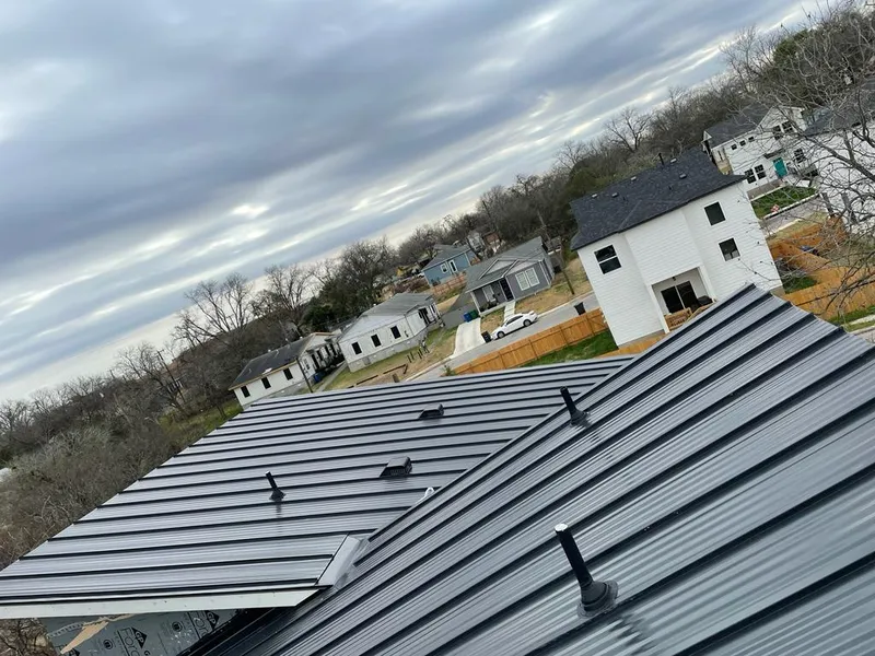 Standing seam metal roof panels with vents for Skylight Repair in North Tonawanda